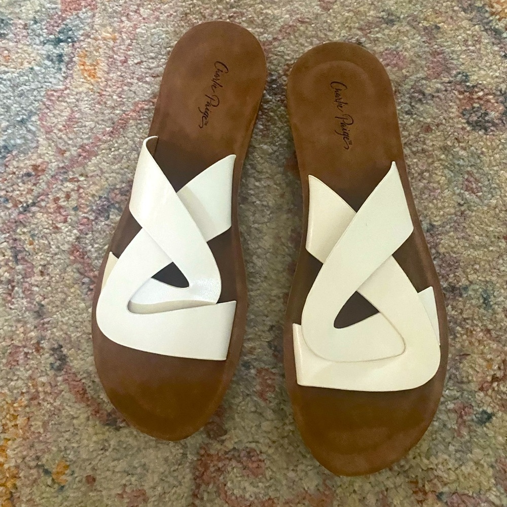 Charlie Paige white Leather slides. Never been worn! Brand new.